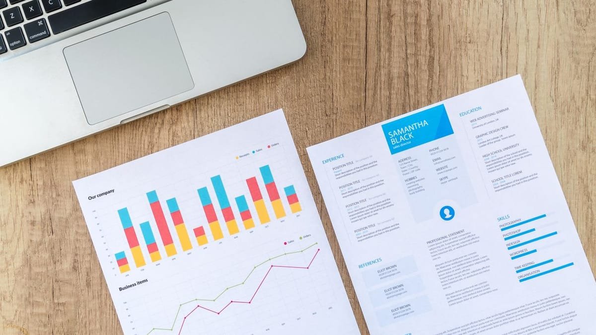 Laptop and reports for keyword research